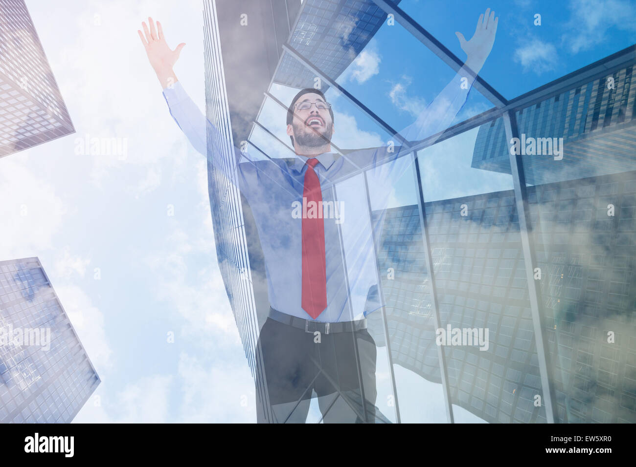 Composite image of happy cheering businessman raising his arms Stock ...