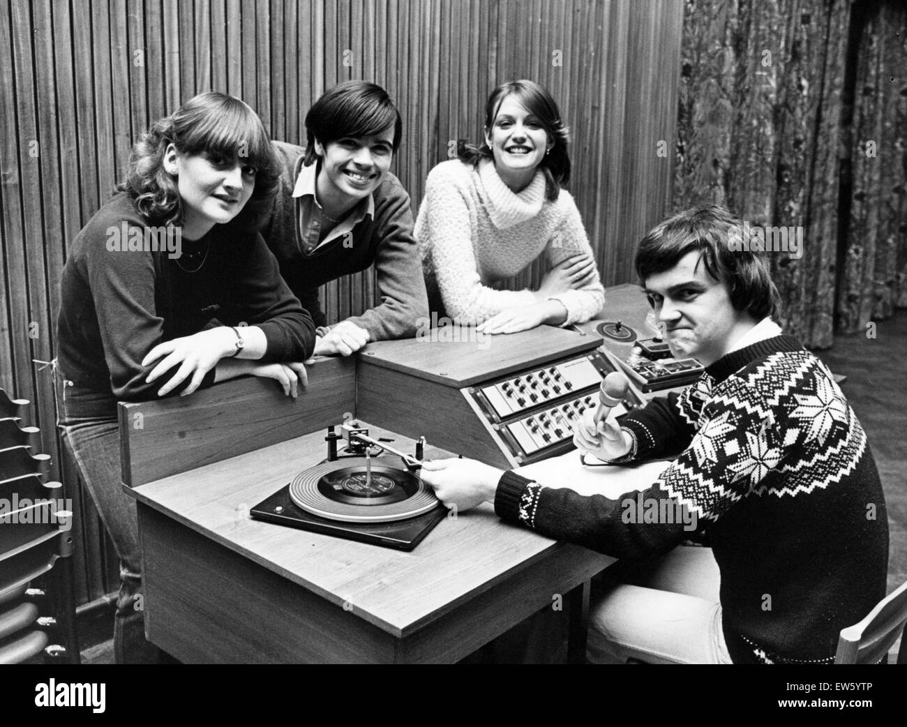 Students from St Mary's Sixth Form College, Middlesbrough, 3rd December 1980. They have launched their own radio station, with the accent on news, views and music. Station master, Paul Flanagan (seated) shows fellow pupils (left to right) Joanne McCurley, Stock Photo