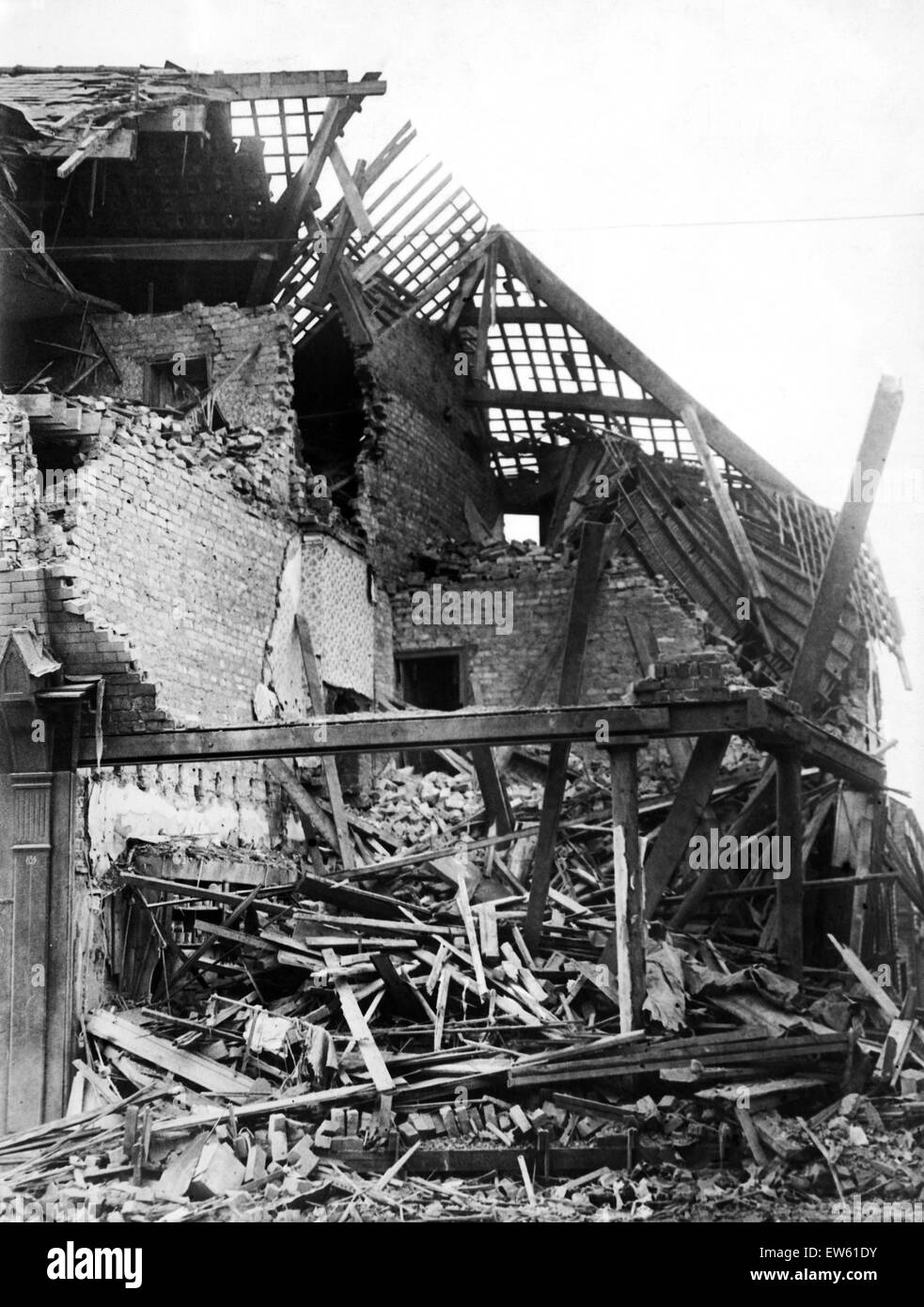 Bomb damage in Wavertree Road, Liverpool. This shop and house was the victim of a direct hit from a Nazi bomb. 18th September 1940. Stock Photo
