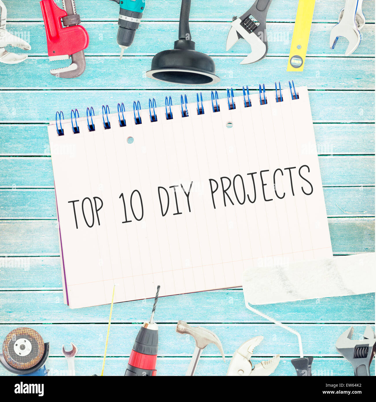 Top 10 diy projects against tools and notepad on wooden background Stock Photo