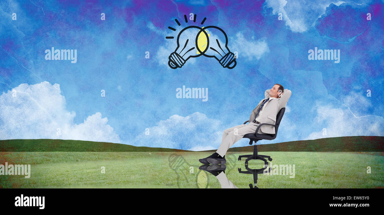 Composite image of businessman relaxing in swivel chair Stock Photo