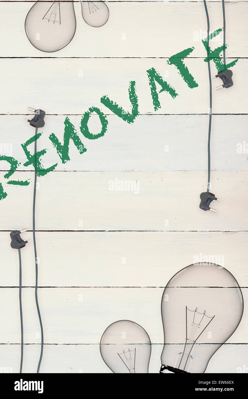 Renovate  against bulb on wooden background Stock Photo