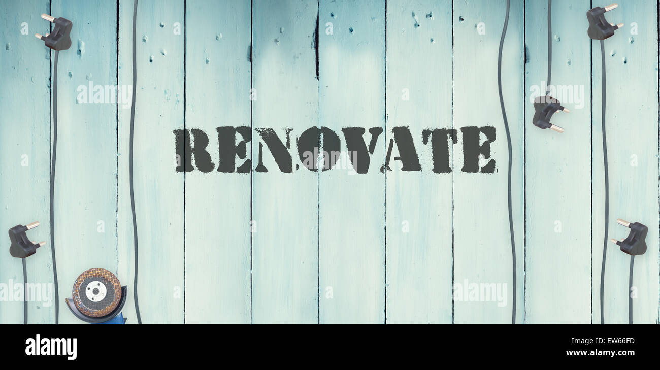 Renovate  against plugs on wooden background Stock Photo