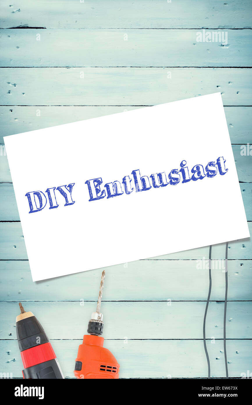 Diy enthusiast against tools on wooden background Stock Photo - Alamy