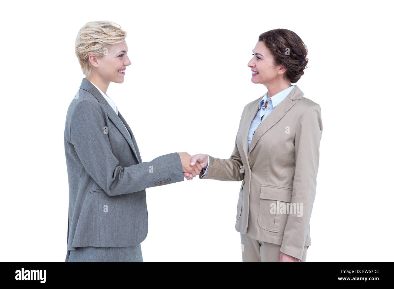 Smiling Women Shaking Hands Stock Photo - Alamy