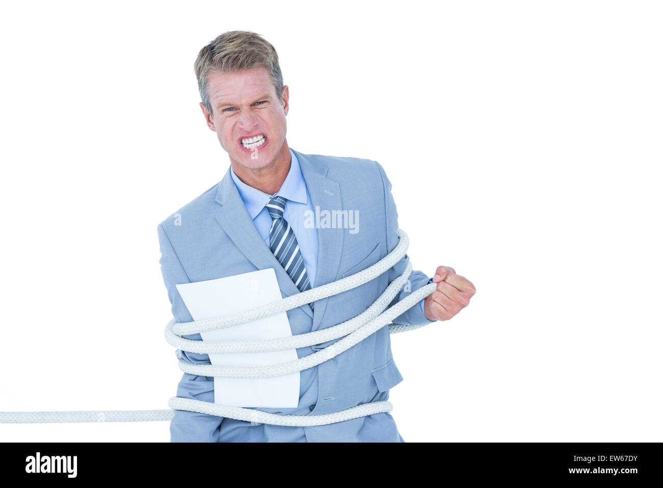 Serious businessman tied up at work Stock Photo Alamy