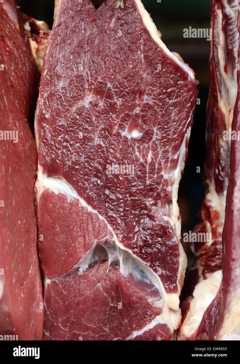 Close up of beef hanging at a market stall in Dhaka Stock Photo - Alamy
