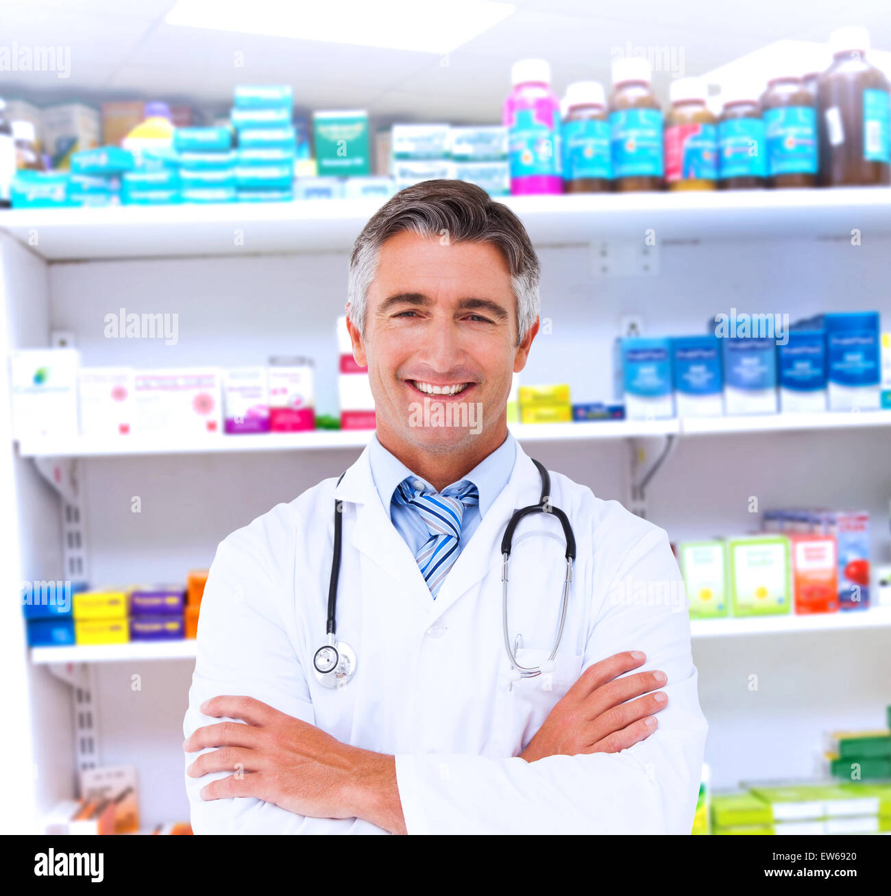 Mature confident happy doctor hi-res stock photography and images - Alamy