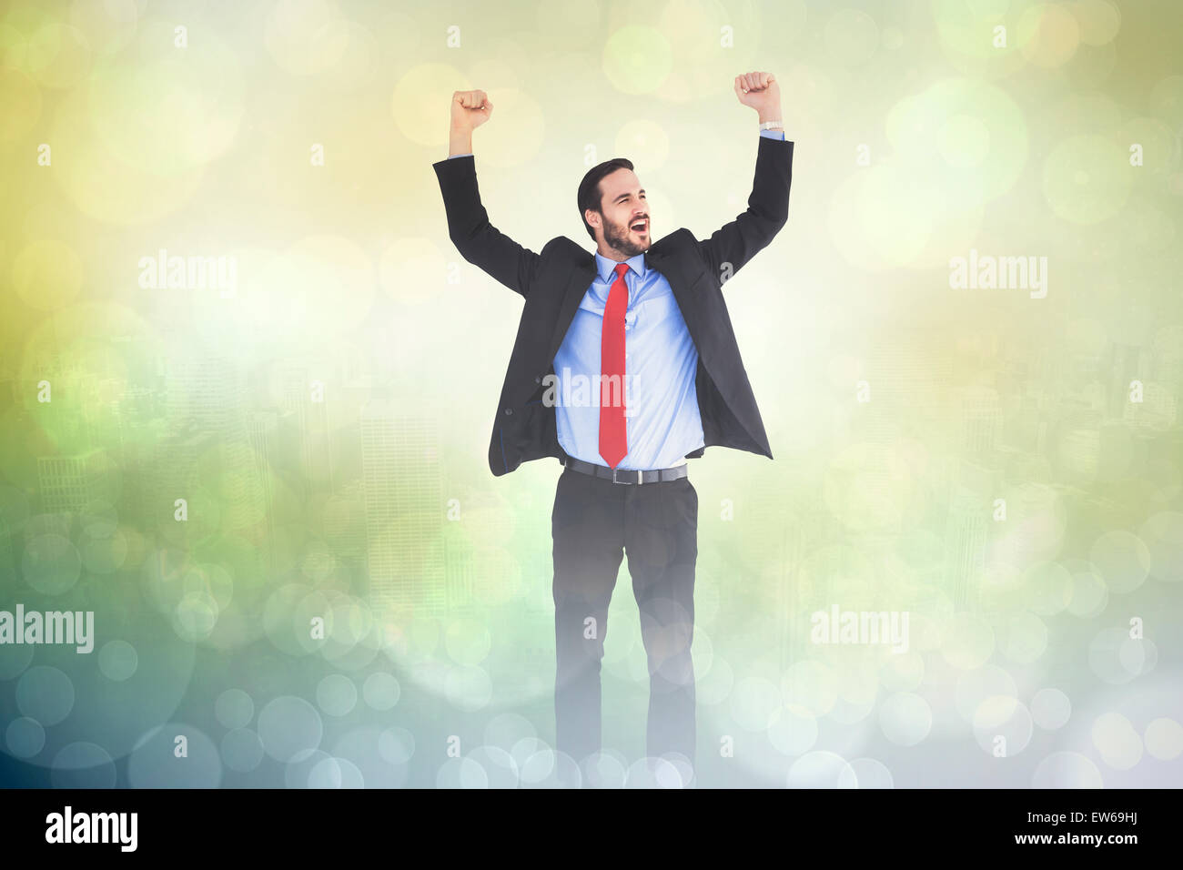 Composite image of happy cheering businessman raising his arms Stock ...