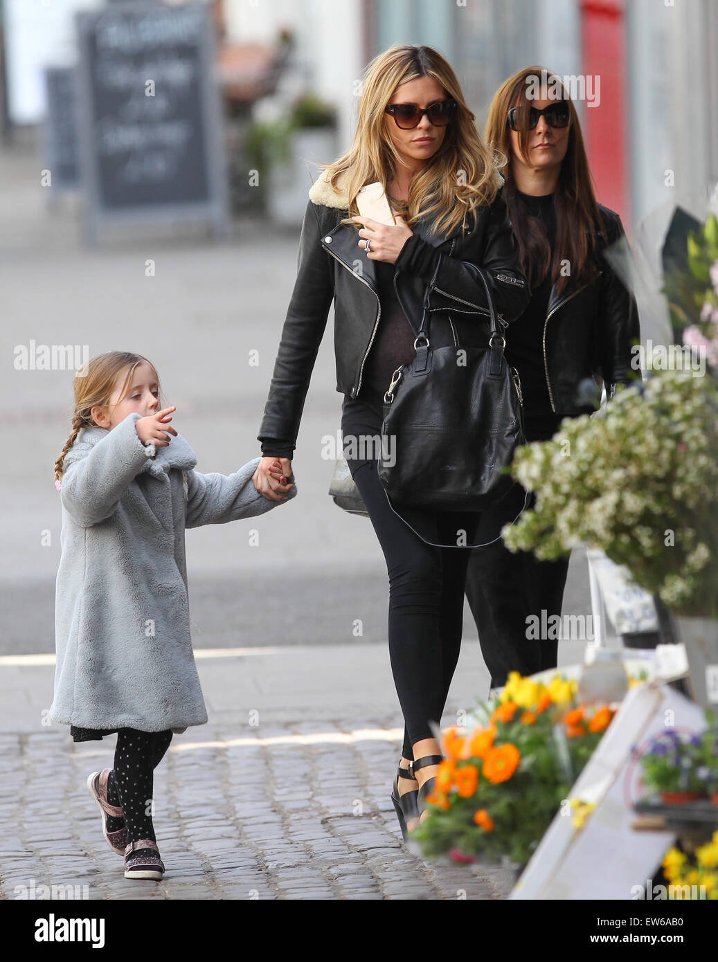 Pregnant Abbey Clancy and her daughter Sophia out with a friend in ...