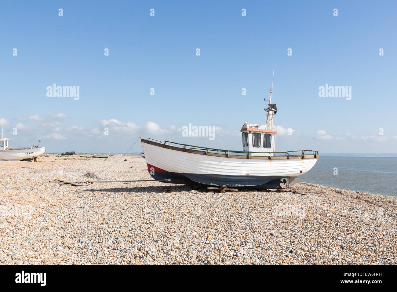 fishing boat on the Kent beach at Dungeness Stock Photo - Alamy