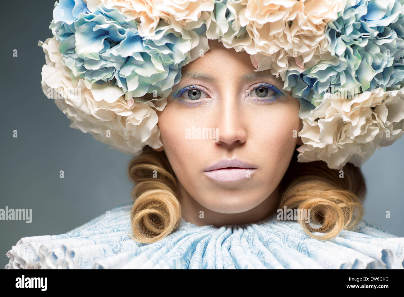 beautiful woman wearing lace collar and flower headpiece Stock Photo