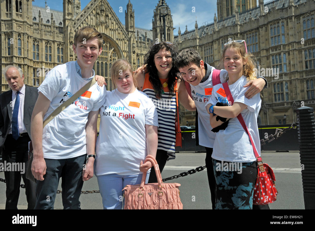 London, UK. 18th June, 2015. Disabled students gather opposite the Houses of Parliament to campaign for equal rights in access to further education. Stock Photo