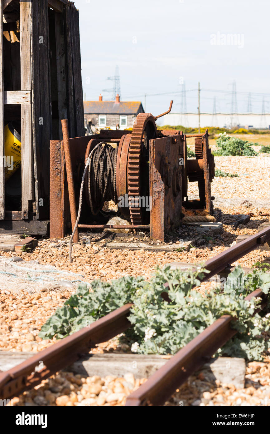 ARusty winch on the Kent beach at Dungeness Stock Photo