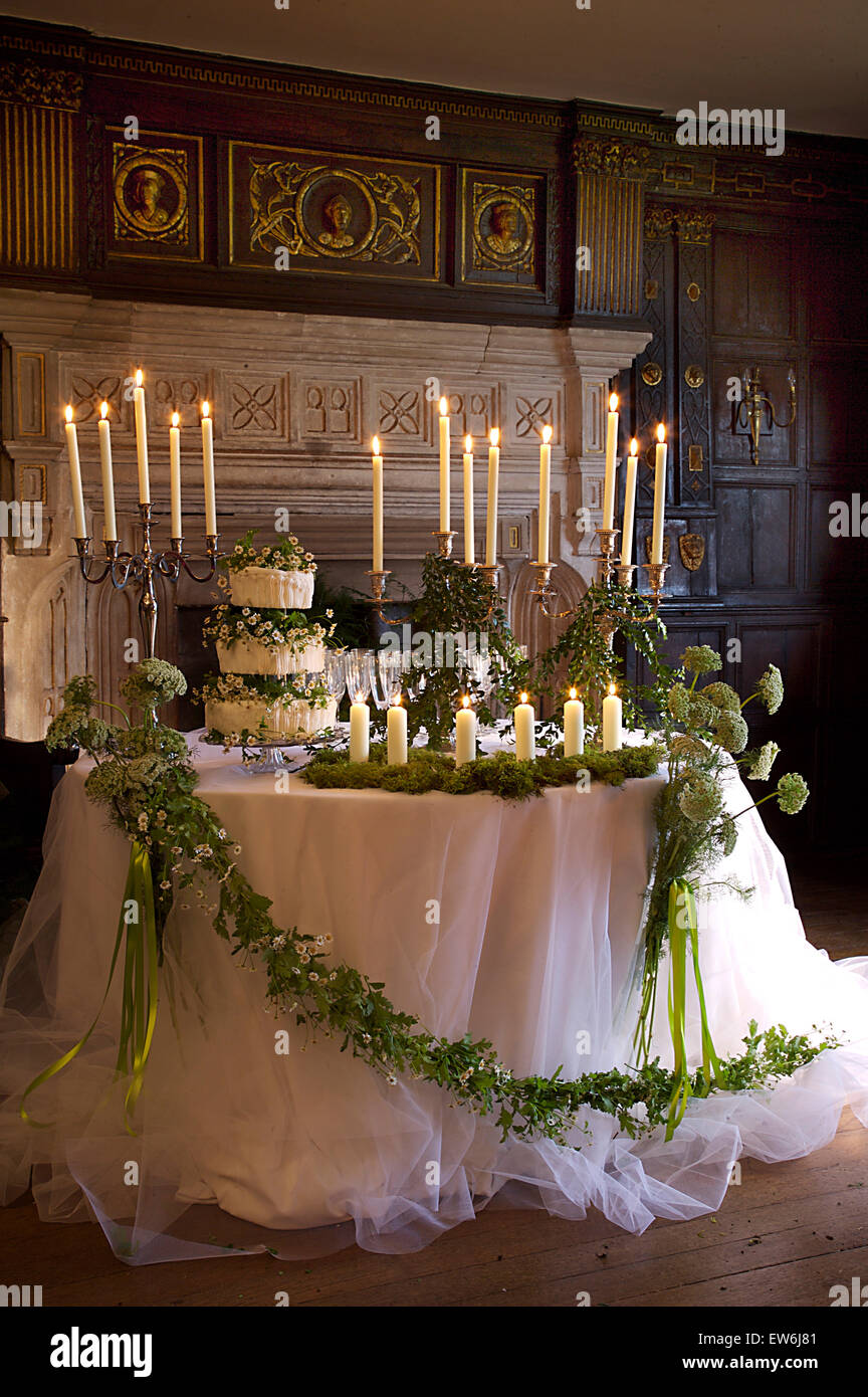 White Net Cloth With Foliage And Wild Flower Garland On Table Set