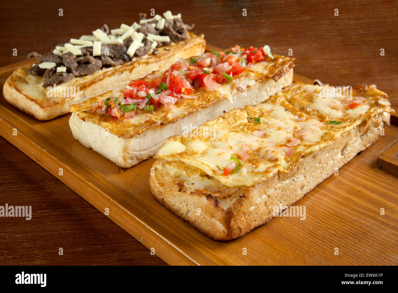 Toasted open faced omelette egg sandwich with melted mozzarella cheese Stock Photo