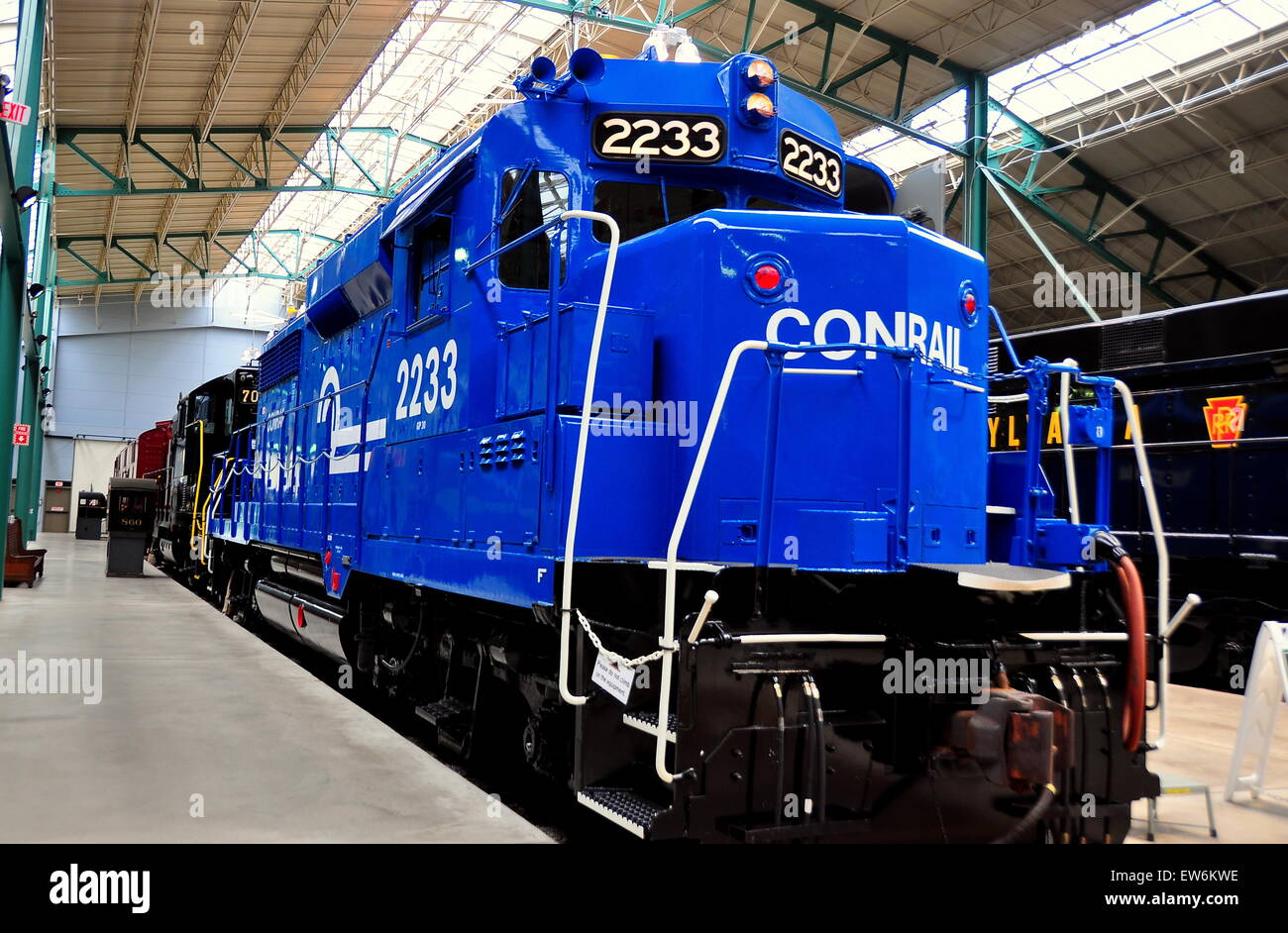 Strasburg, Pennsylvania:  A bright blue diesel Conrail engine in the display shed at the Railroad Museum of Pennsylvania  * Stock Photo