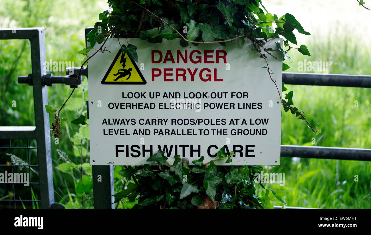 Danger, Fish With Care Sign, Rural River Fishing, Overhead
