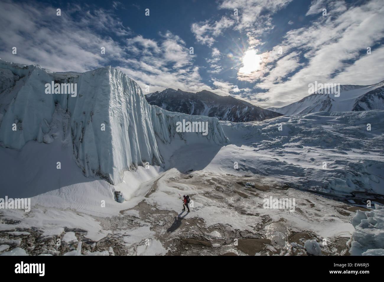 A scientist does research in a melt area of the Canada Glacier, Antarctica Stock Photo