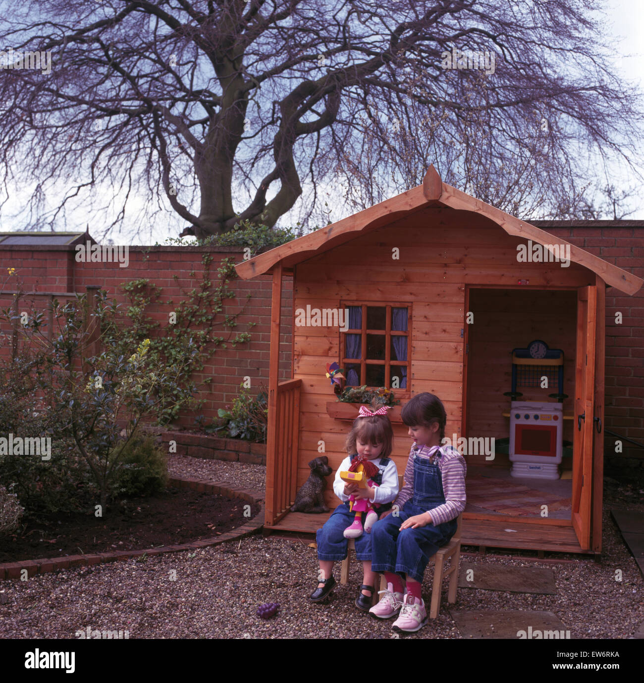 girls outside playhouse