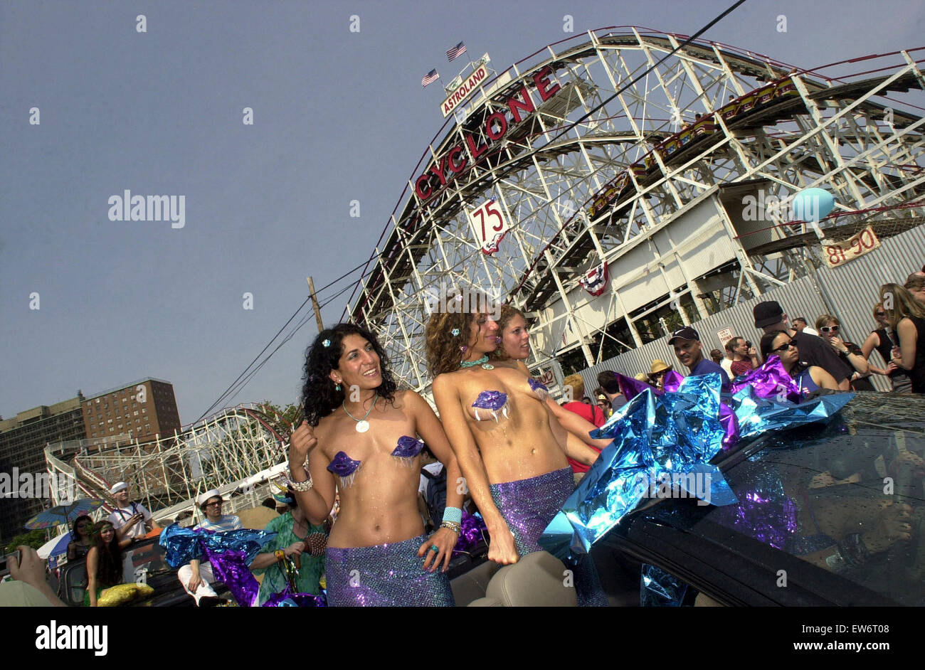 (L-R) Jen Cohen, Elizabeth Gabbay, and Shelly Sabel frolic in The Mermaid Parade in famed Coney Island on Surf Avenue on June 22, 2002.  The parade, which celebrates the coming of the Summer Season brings outs eccentrics, exhibitionists and just plain old folk in their finest Mermaid, Merman and sometimes unrecognizable costumes.  (© Frances M. Roberts) Stock Photo