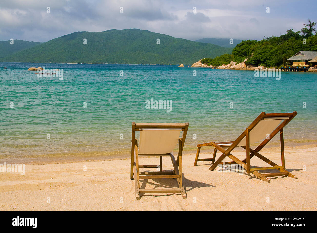 Deck chairs on beach hi-res stock photography and images - Alamy