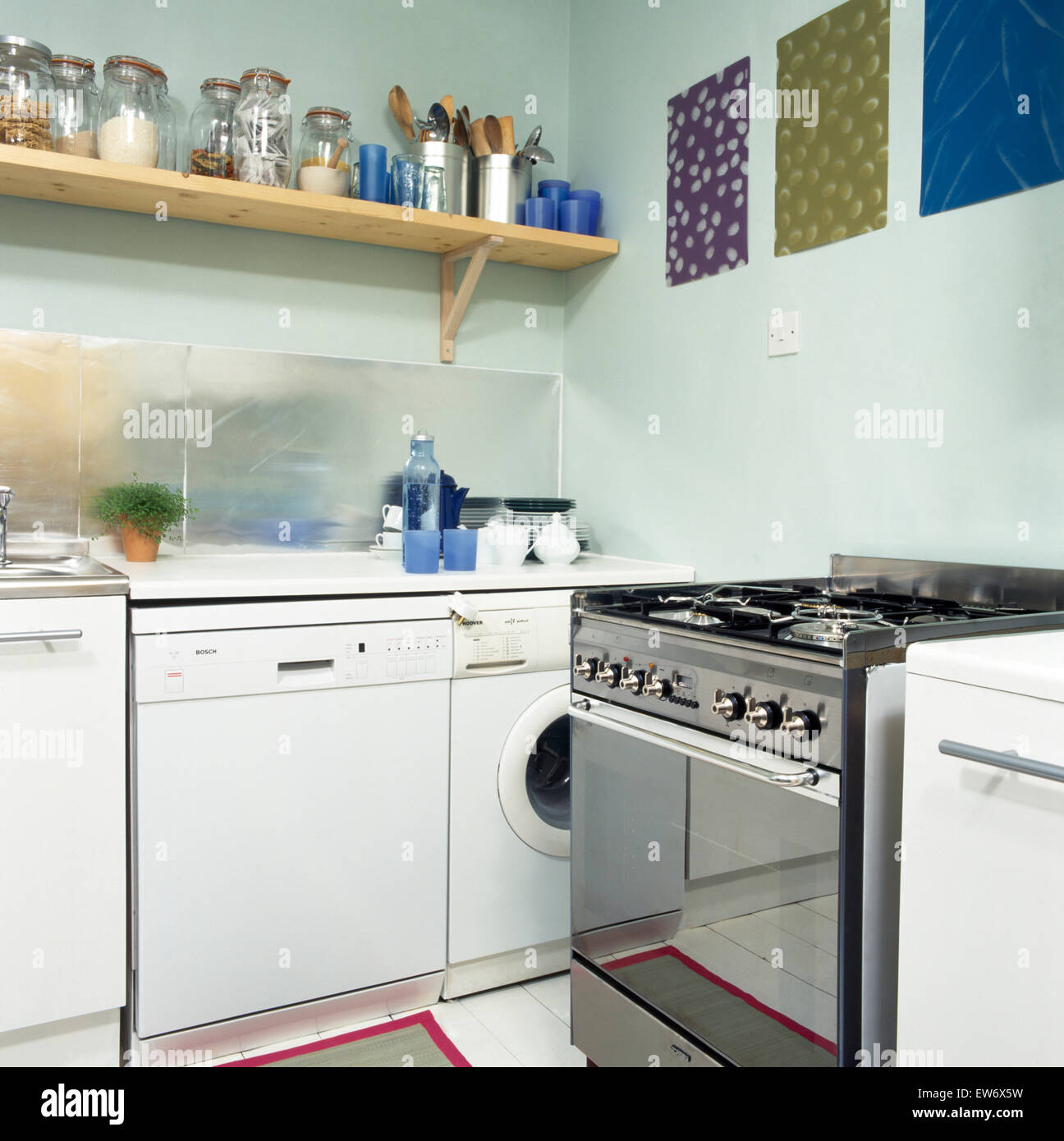 Range oven and dishwasher in nineties economy style kitchen Stock Photo