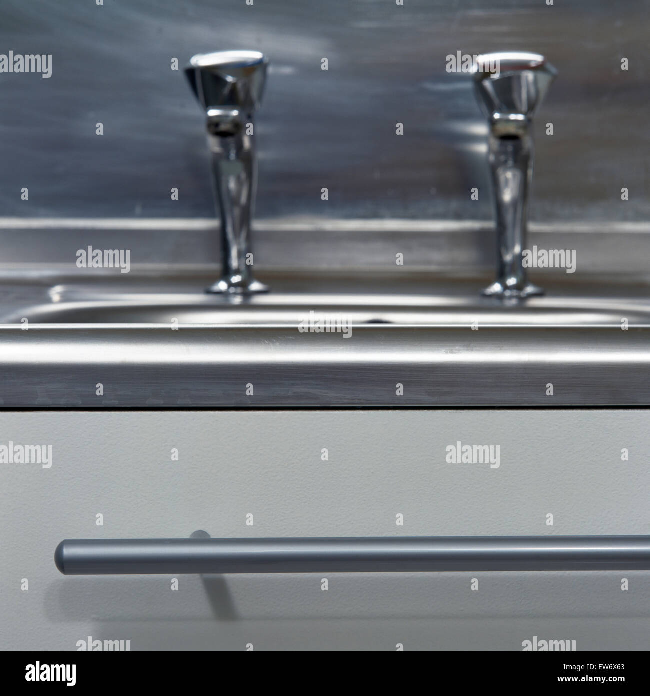Closeup of stainless steel taps Stock Photo Alamy