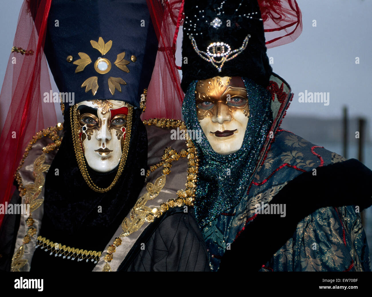 Revellers wearing traditional masks and robes at the Carnival in Venice FOR EDITORIAL USE ONLY Stock Photo Alamy