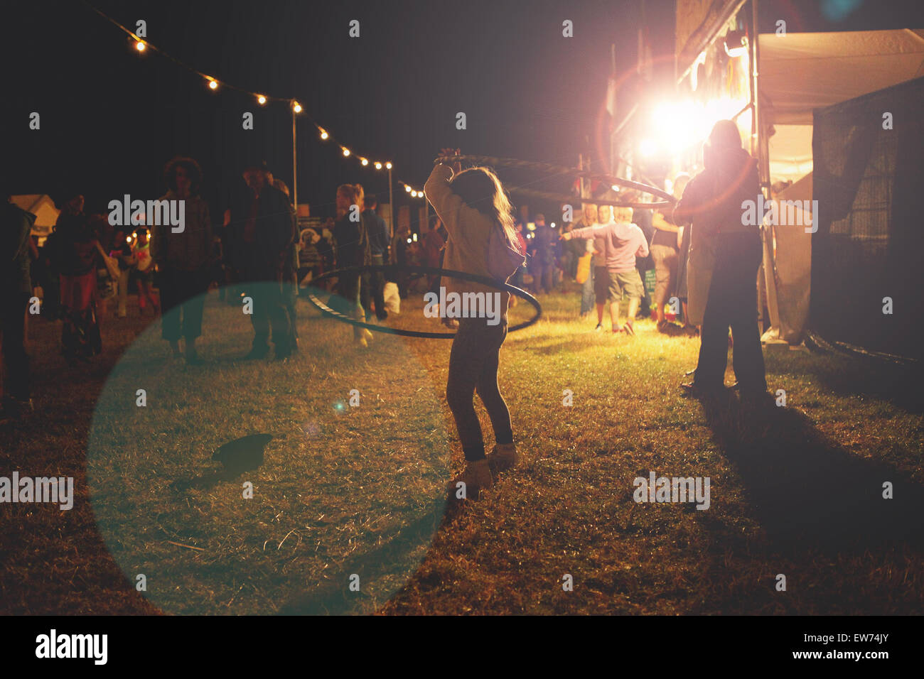 Girl hula hooping at night Stock Photo Alamy