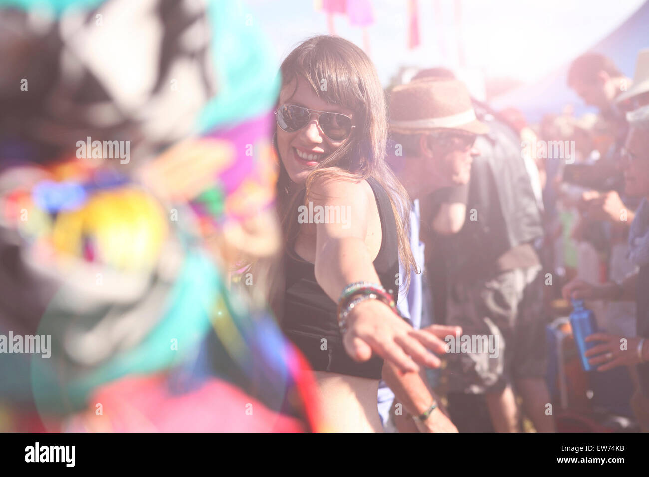 Girl dancing at summer music festival Stock Photo - Alamy