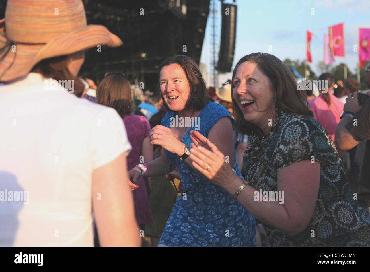 Older women dancing at music festival Stock Photo