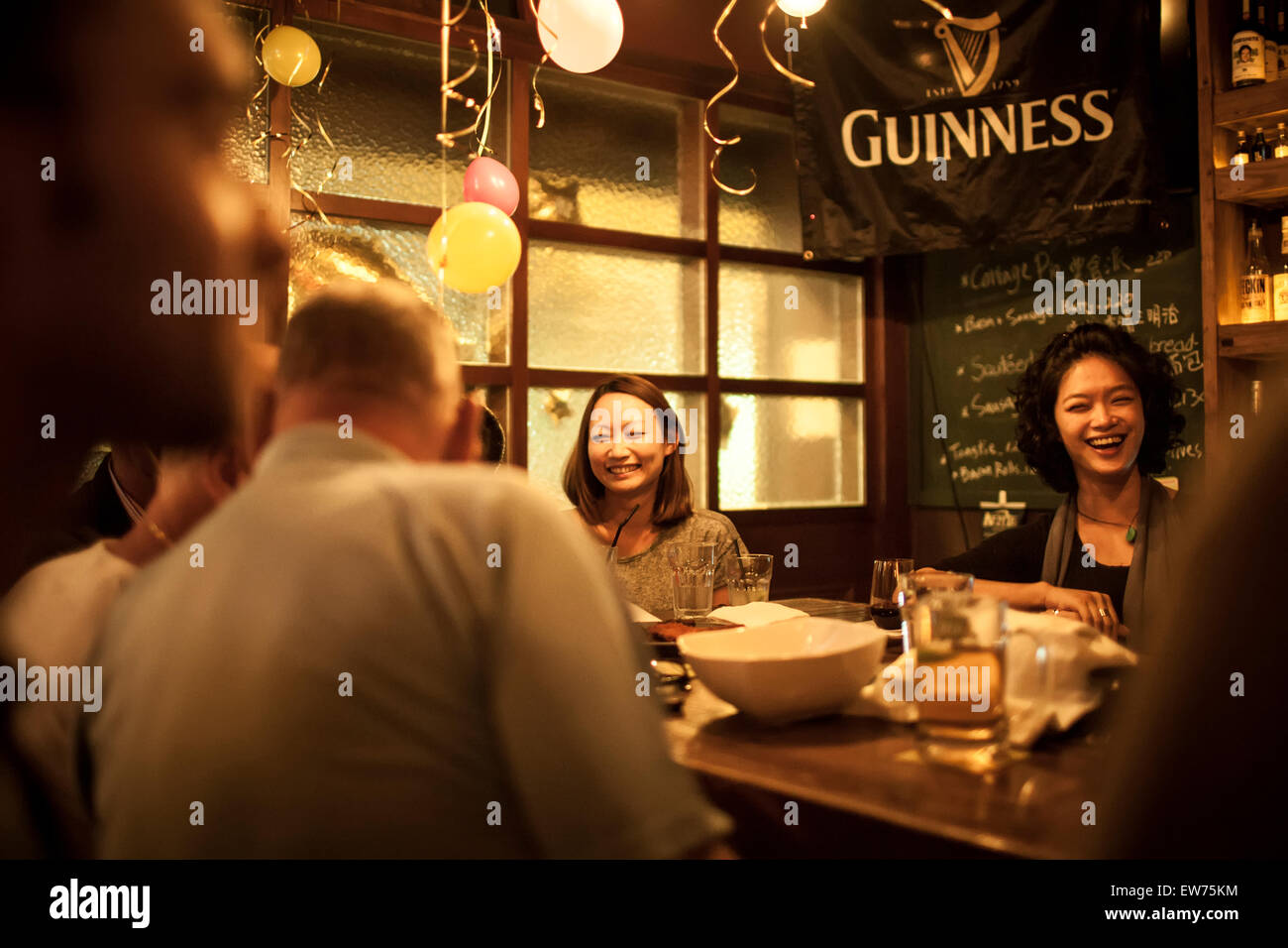 Irish bar in Taiwan, People celebrating Stock Photo