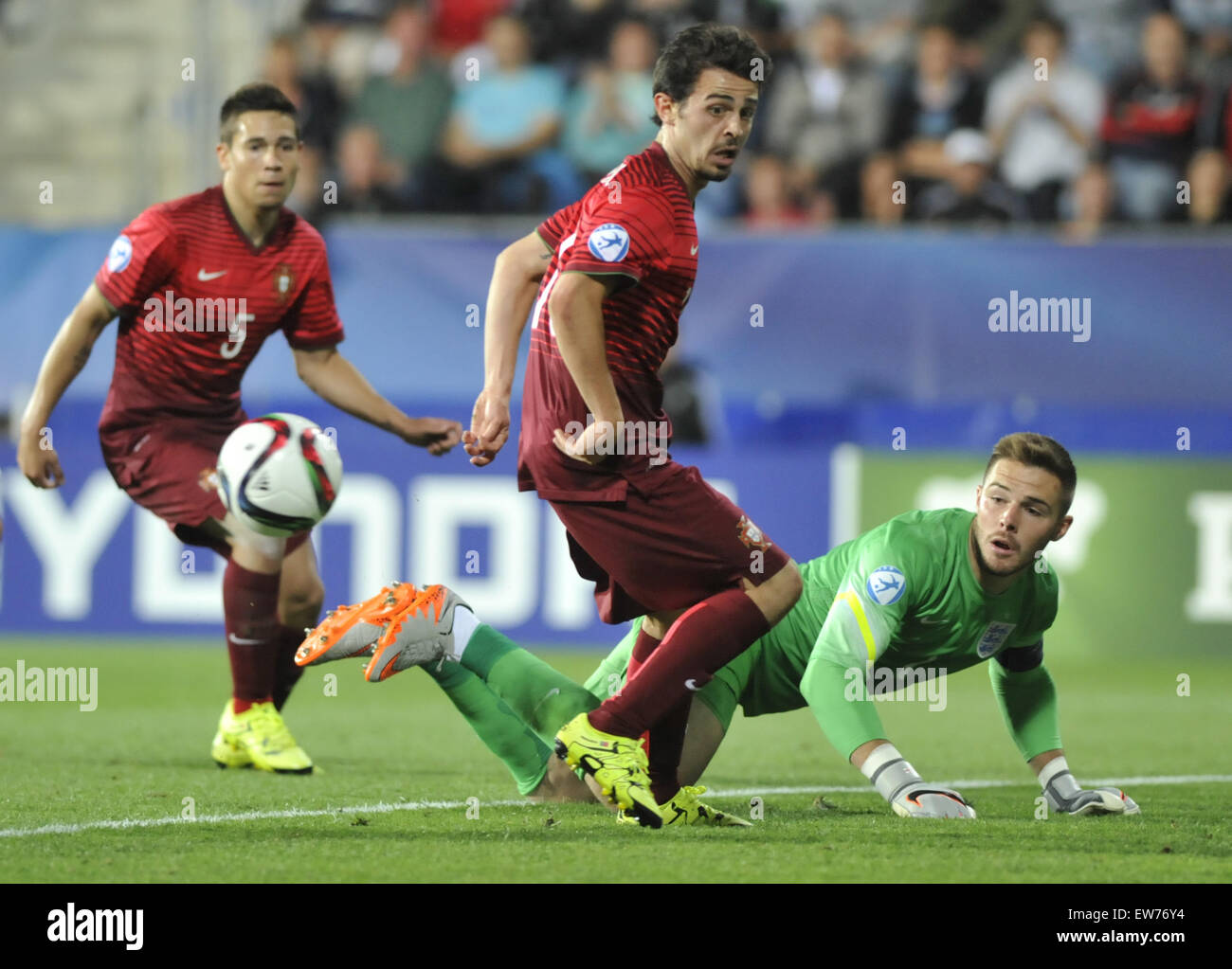 Uherske Hradiste, Czech Republic. 18th June, 2015. From left: Raphael Guerreiro and Bernardo Silva of Portugal and Jack Butland of England in action during the UEFA European U21 soccer championship group B match England vs Portugal in Uherske Hradiste, Czech Republic, June 18, 2015. Credit:  Dalibor Gluck/CTK Photo/Alamy Live News Stock Photo