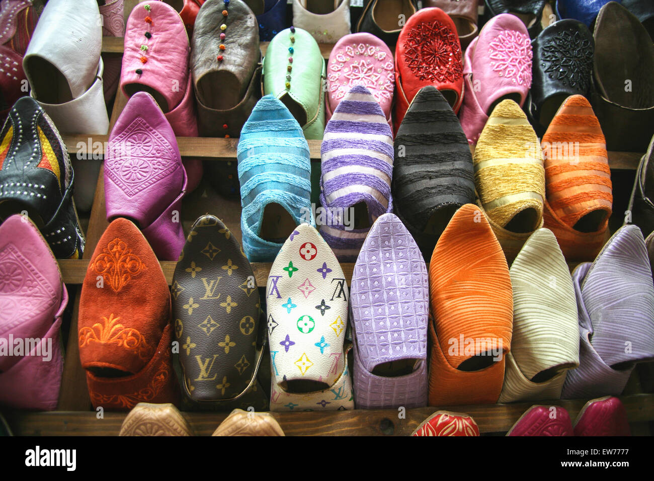 Fake,Counterfeit goods.Colourful slippers/ shoes/ local style leather  babouches handcrafted by Moroccan artisans for sale street stall,  souk,Marrakesh Stock Photo - Alamy