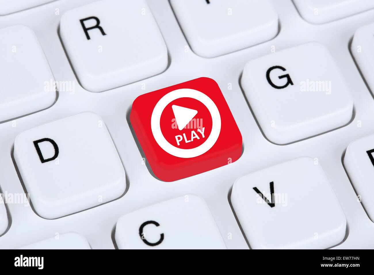 Play Button for listening to music or movie on internet computer keyboard Stock Photo