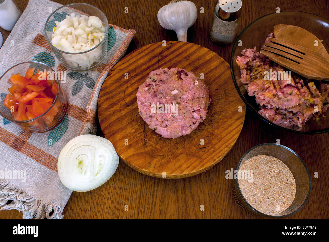 cooking hamburguer and the ingredients required to do them Stock Photo ...