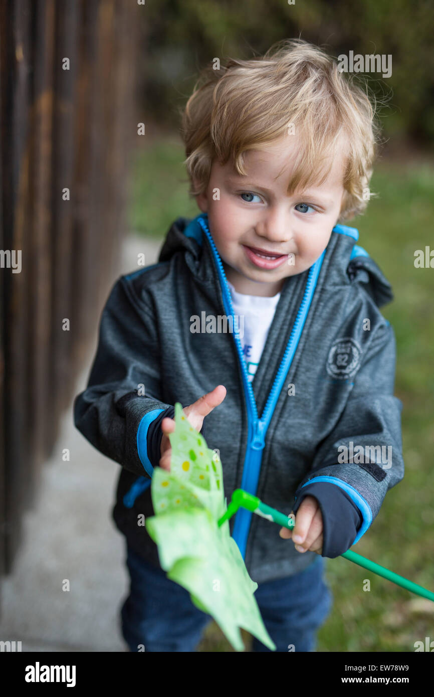 Little boy with whirligig Stock Photo