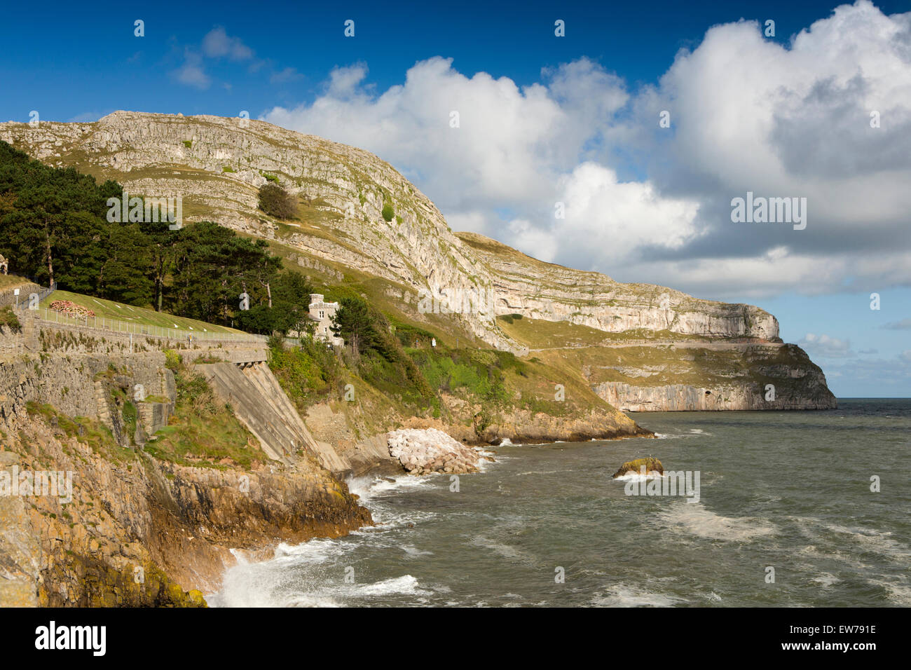 UK, Wales, Conwy, Llandudno, Great Orme and coastal toll road at high tide Stock Photo