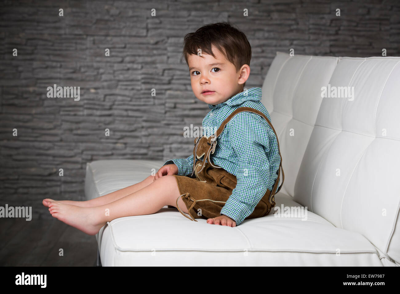 Little boy with leather pants Stock Photo Alamy