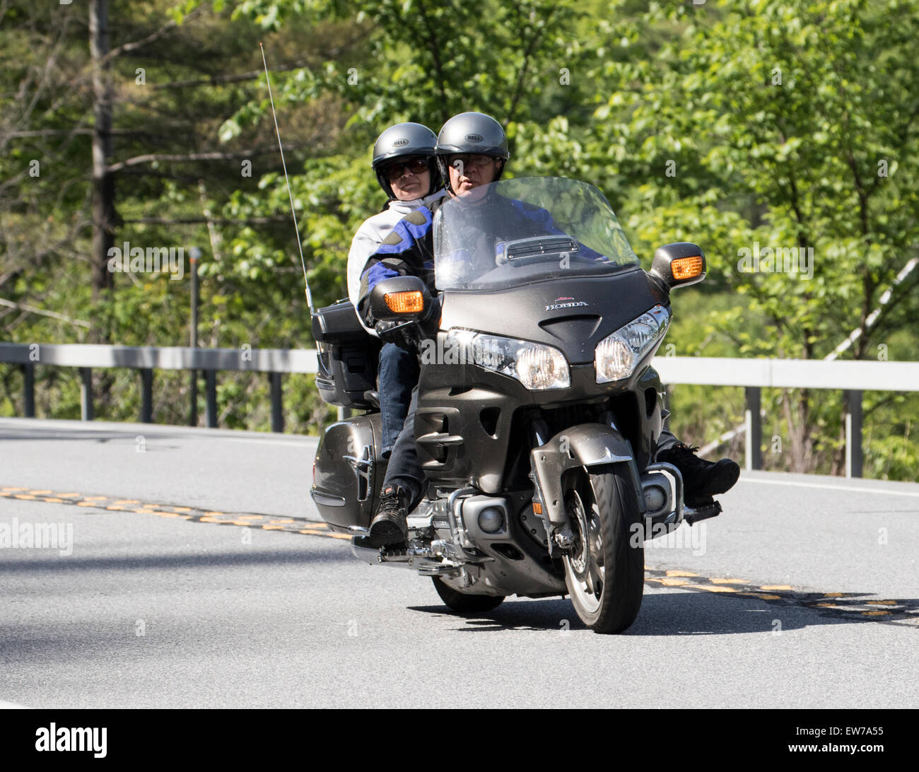Senior couple man and woman married on a Silver Honda Goldwing. Stock Photo