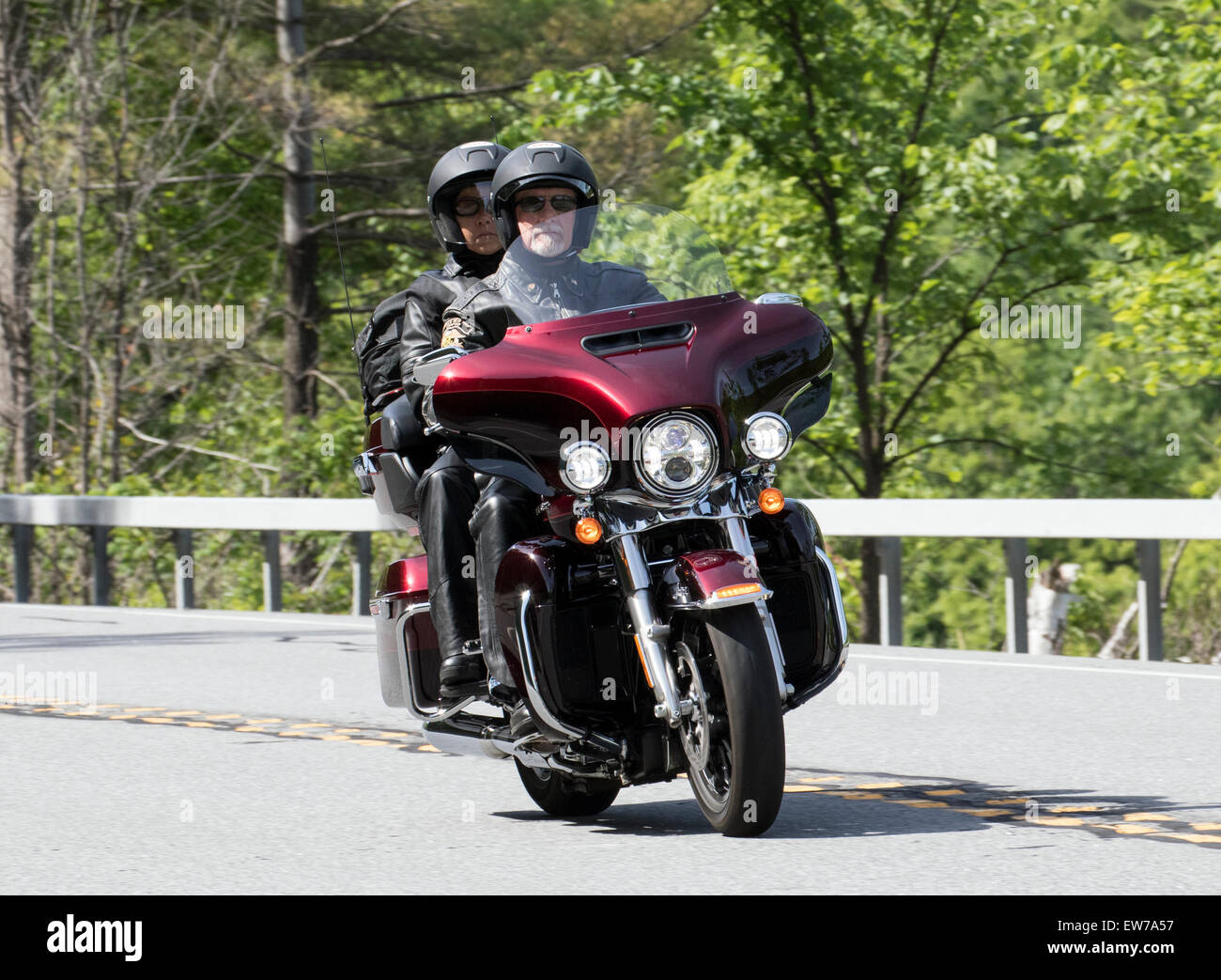Senior couple man and woman on a Harley Davidson motorcycle motorbike. Stock Photo