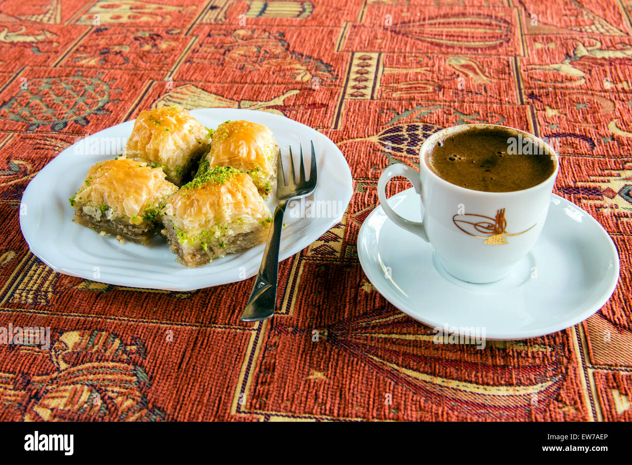 Plate with traditional baklava Turkish sweet and cup of turkish coffee Stock Photo