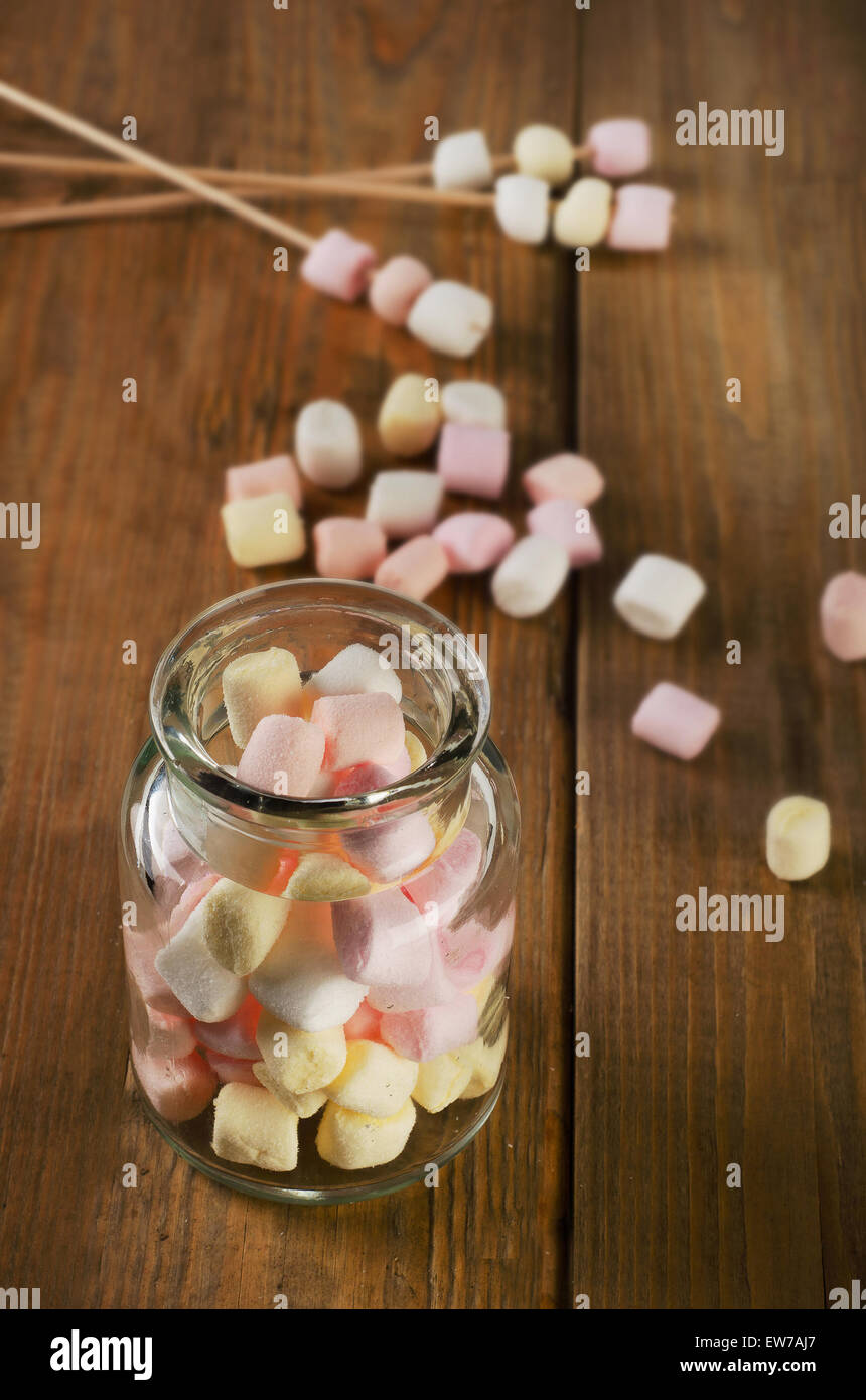 Marshmallows in a glass jar. Selective focus Stock Photo Alamy