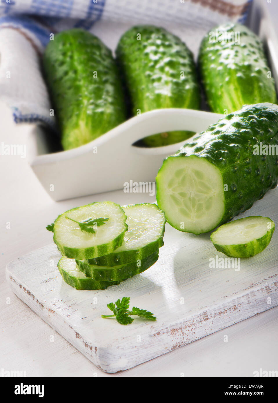 Fresh Sliced cucumber on  cutting board. Selective focus Stock Photo