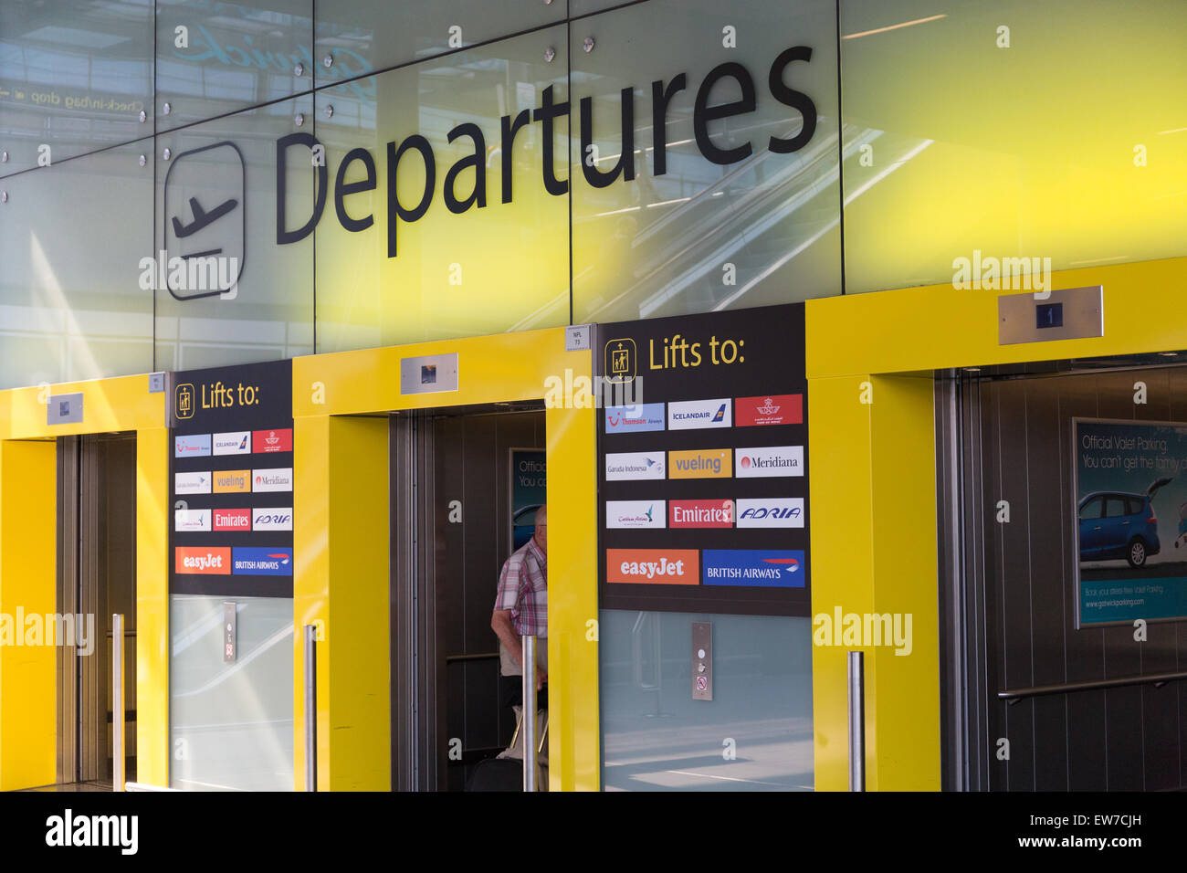 Departure lifts at the North Terminal of London Gatwick airport, London
