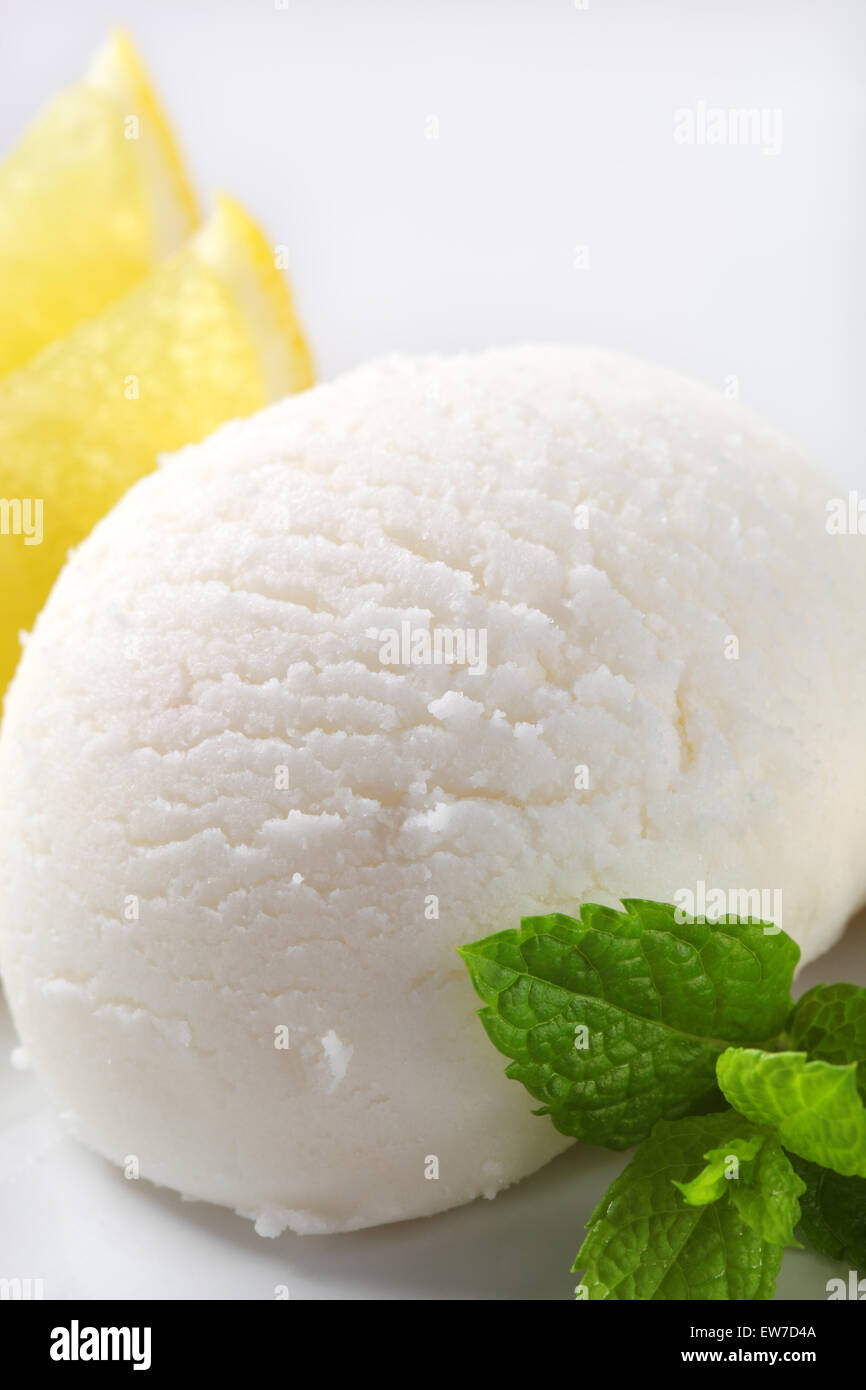 Scoop of lemon ice cream Stock Photo
