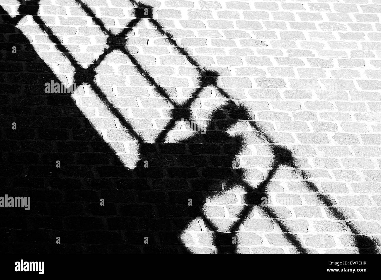 person walkiing shadow. black and white Stock Photo