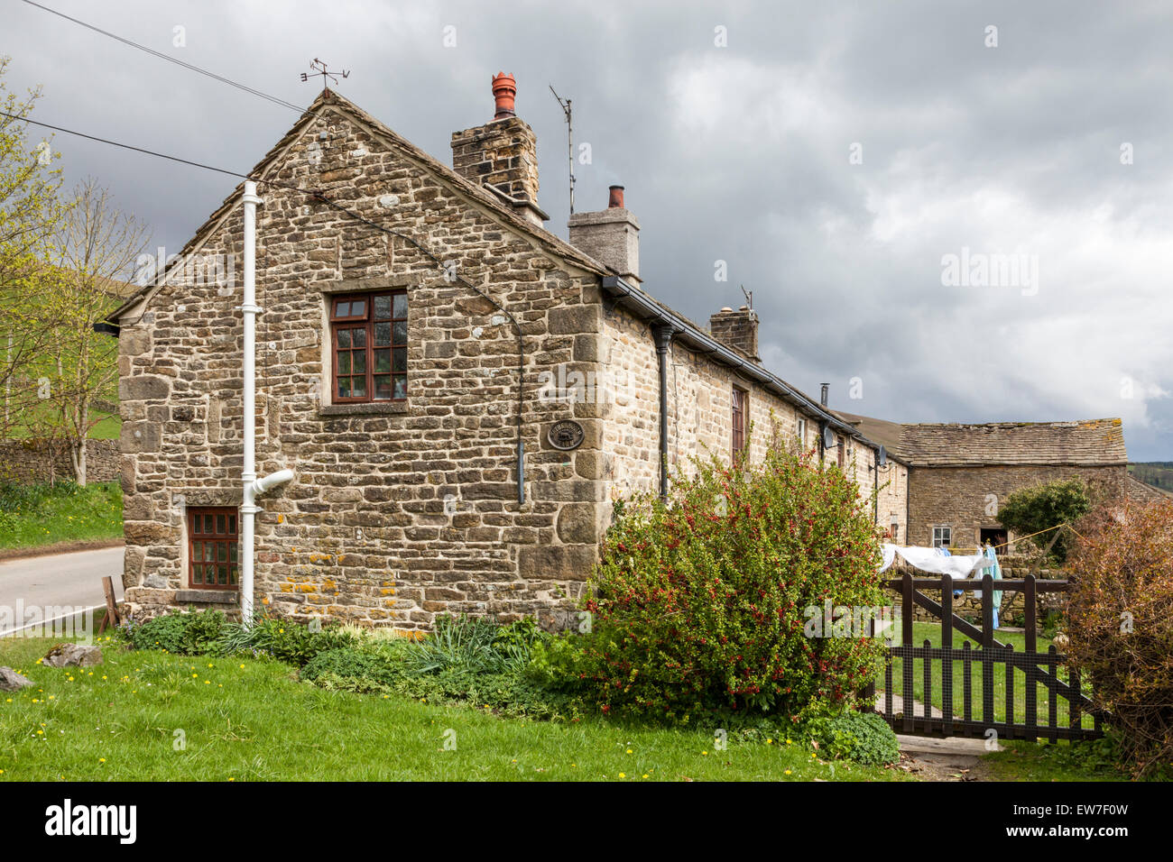 A typical stone built cottage at Nether Booth Farm, Nether Booth, Derbyshire, Peak District, England, UK Stock Photo