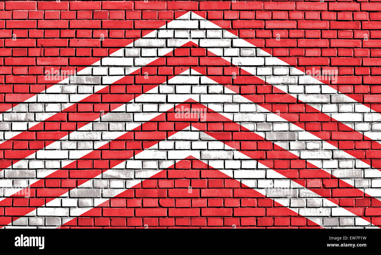 flag of Glamorgan painted on brick wall Stock Photo